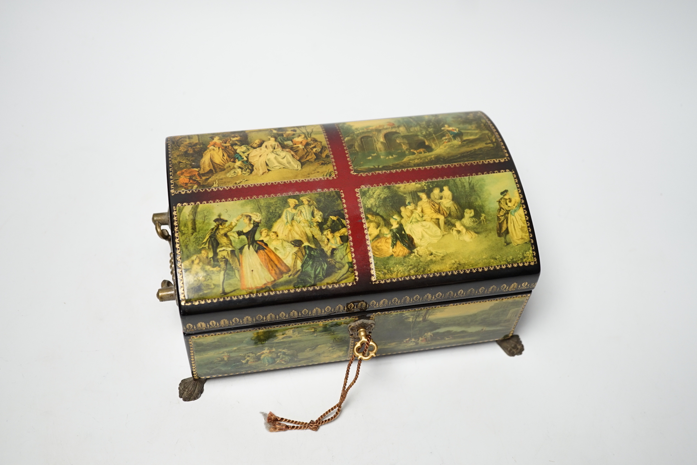 A Swiss papier maché four air musical box in Russian style, 23cm wide